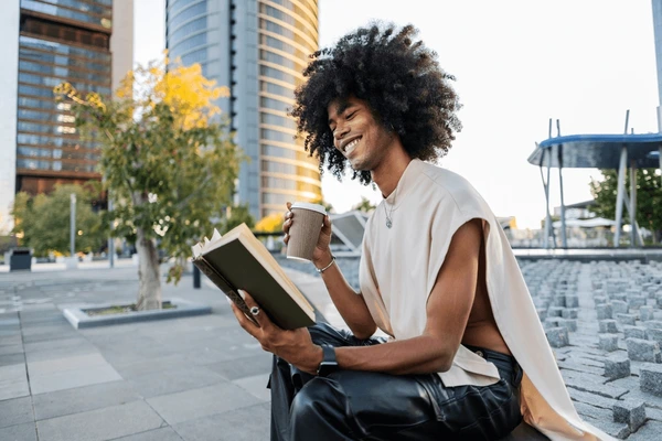 A young woman enjoying her book. Photo courtesy