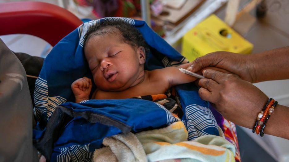 Refugees children in Rusizi getting measles and rubella vaccinations. Courtesy