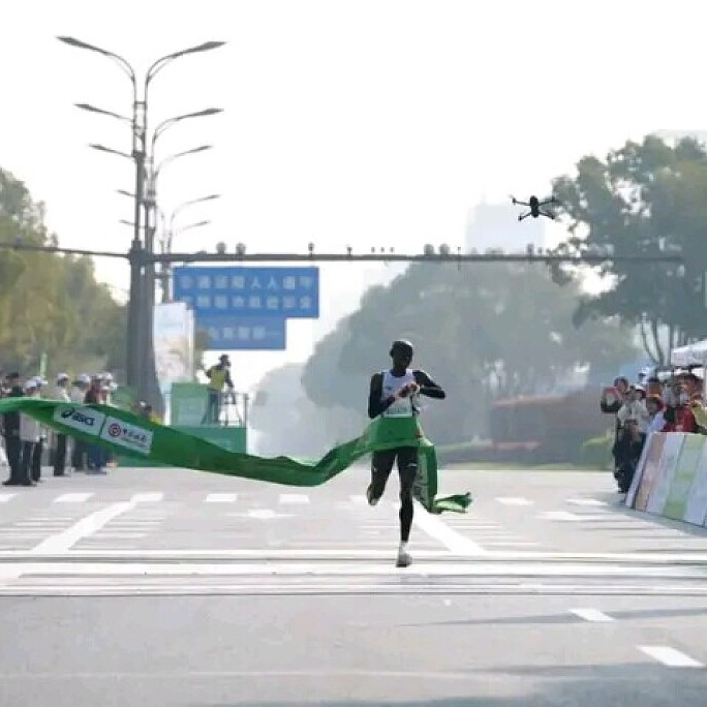 Kenya’s Miriam Chebet crosses the finish line at the Yangzhou Half Marathon
