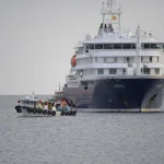Passengers from more than 20 countries were flown home after a deadly virus outbreak aboard a cruise ship.